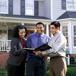 Real estate agent showing house to a couple